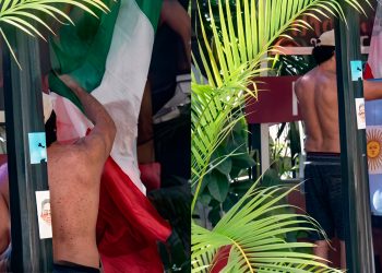 Turistas argentinos quitan bandera de Mexico en Quintana Roo