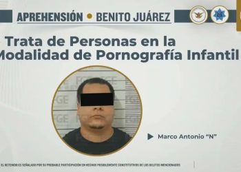 Marco Antonio “N” detenido durante un cateo realizado por la Fiscalía de Quintana Roo en Cancún.